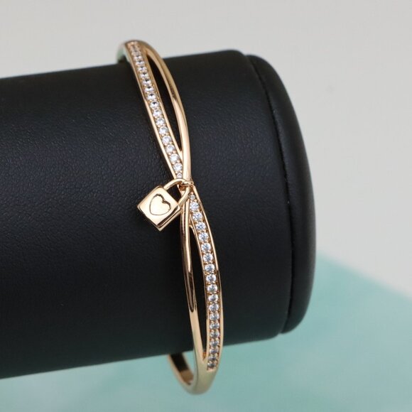 Rose Gold Bangle with Heart Lock Charm and Crystal Accent, XPBL0485 - Picture 1 of 11